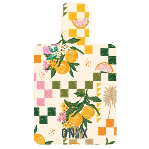 A rectangular Pilates reformer mat with a colorful floral and citrus fruit pattern, featuring the brand name 'ONYX' on the bottom right corner.